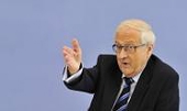 In China, German minister warns of global trade war