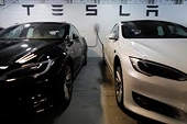 Tesla worried by China tariffs even as deliveries surge